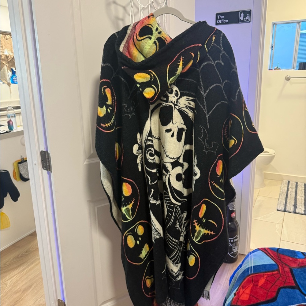 Jack the skeleton poncho, thick, practically new worn twice.